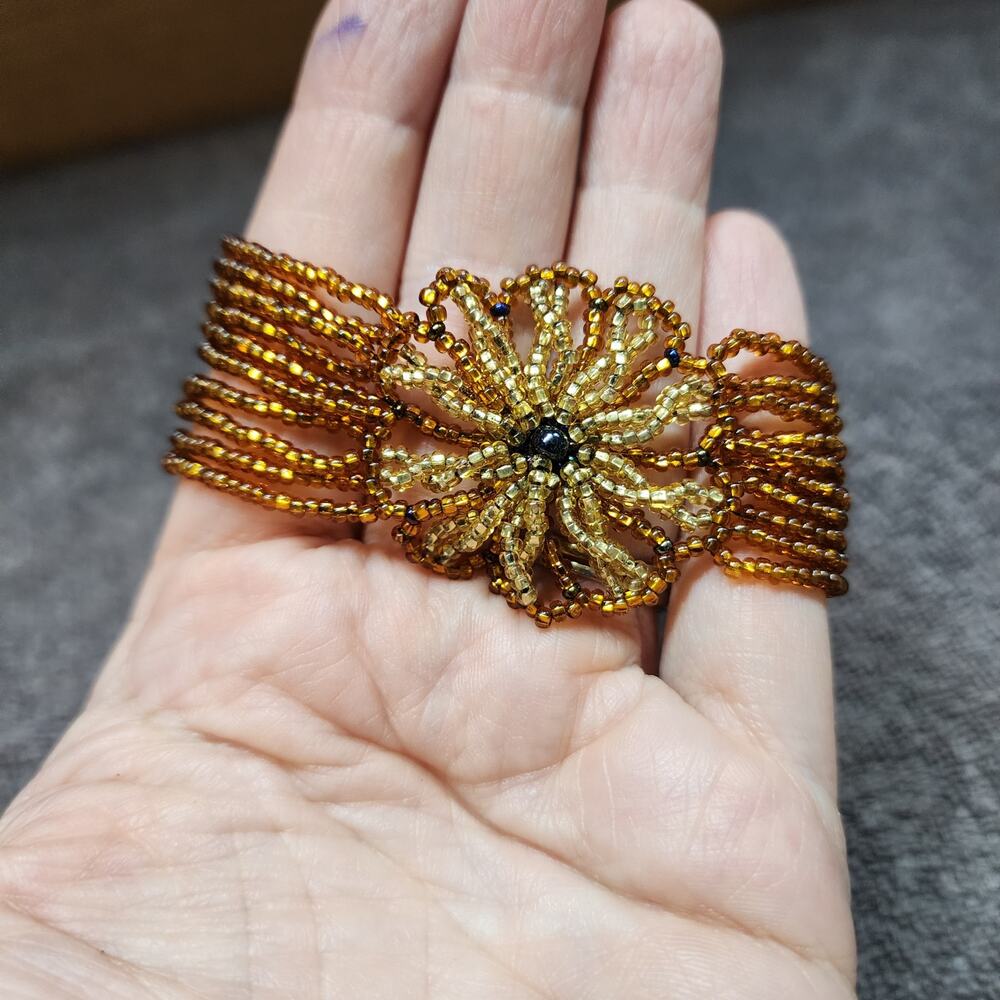 Multi strand amber colored Beaded bracelet Flower b34